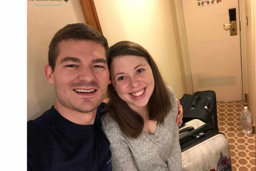 Tyler Torres (left) and his wife Rachel Torres, both 24, have been quarantined at Joint Base...