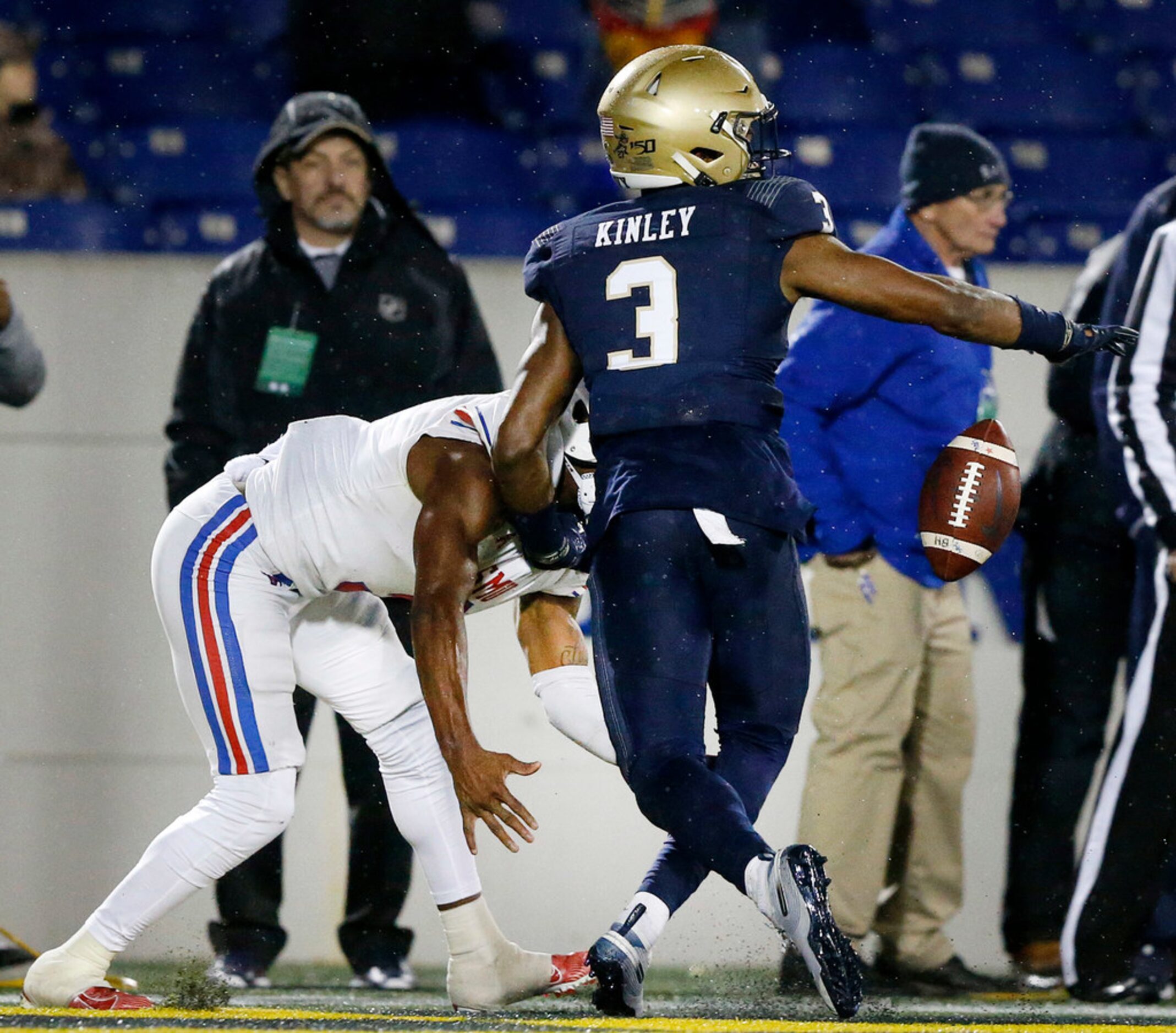 Navy Midshipmen cornerback Cameron Kinley (3) keeps Southern Methodist Mustangs wide...