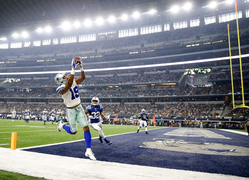 FILE - Brice Butler (19) catches a pass out of bounds in front of Indianapolis free safety...