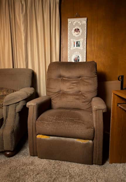 The worn recliner that was Dora Overton's late husband's favorite.