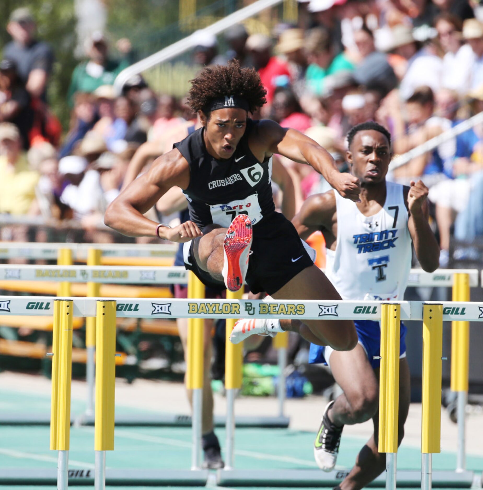 St Michaels Elijah Gifford wins the 5A mens 110 high hurdles at the TAPPS State track meet...