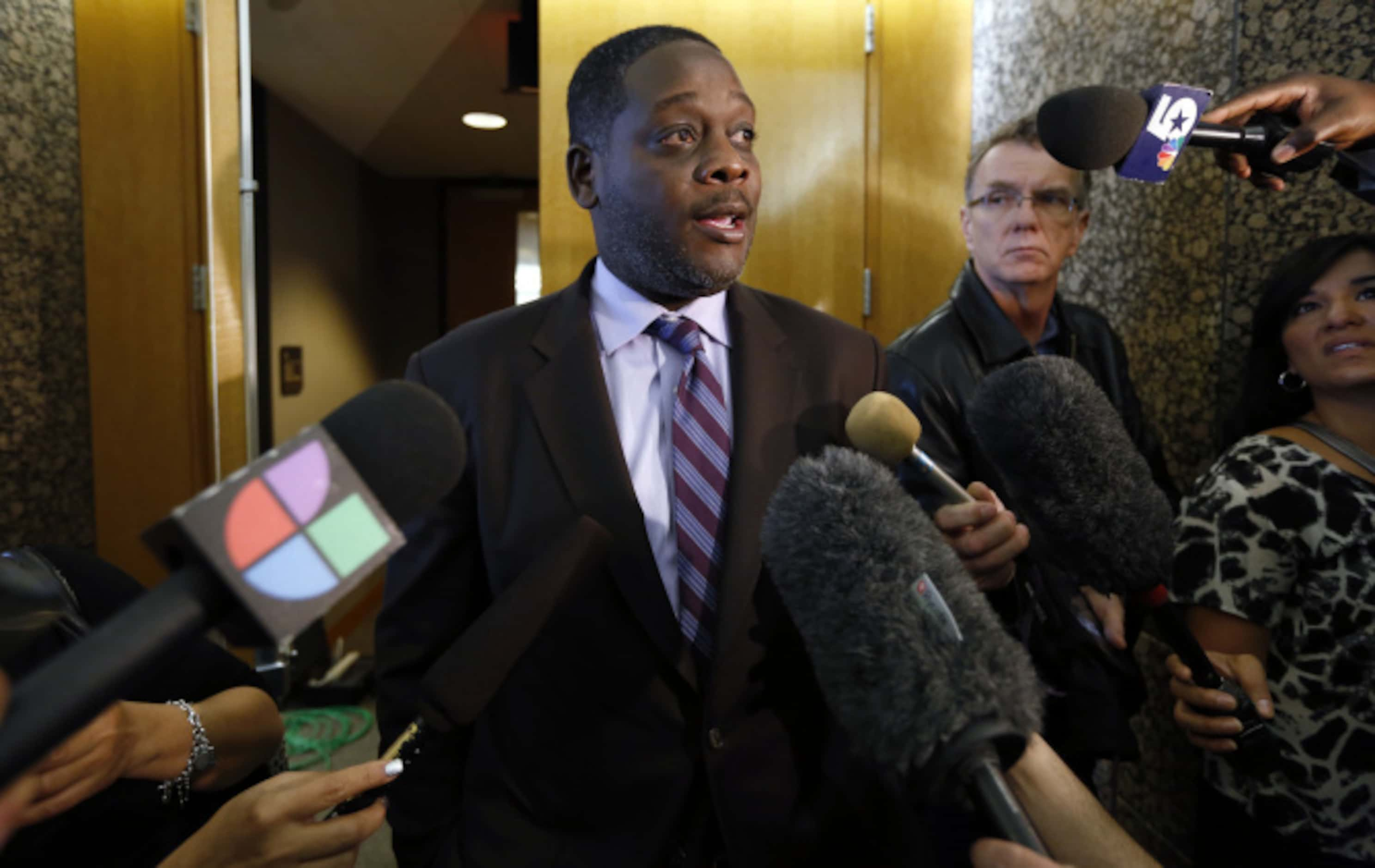 Dallas County District Attorney Craig Watkins talks to the media after the bond reduction...