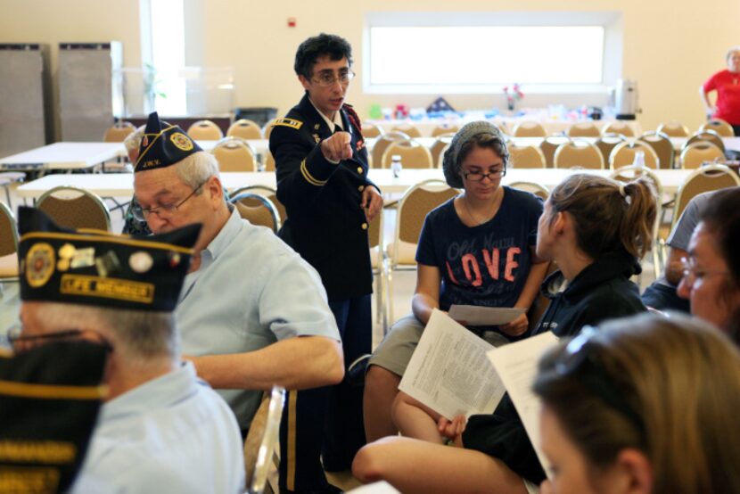 Karyn Berger, a rabbi at Fort Hood,  spoke to Cheyenne Montoya, 16, and other teens during a...