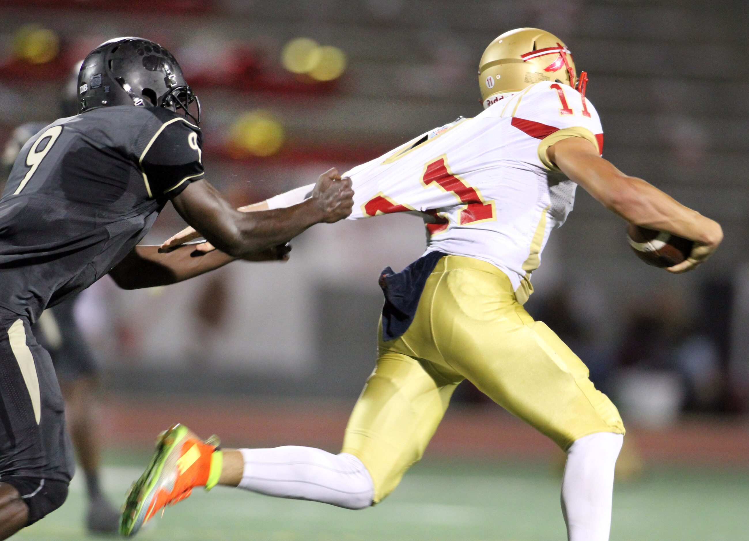 South Grand Prairie quarterback Greg Eisworth (11) rushes during second quarter action as...