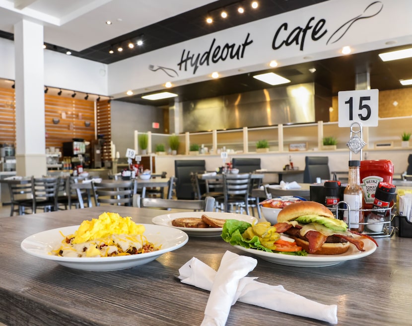 Two popular dishes are served at Hydeout Cafe, including the Hash Stack (left) and avocado...