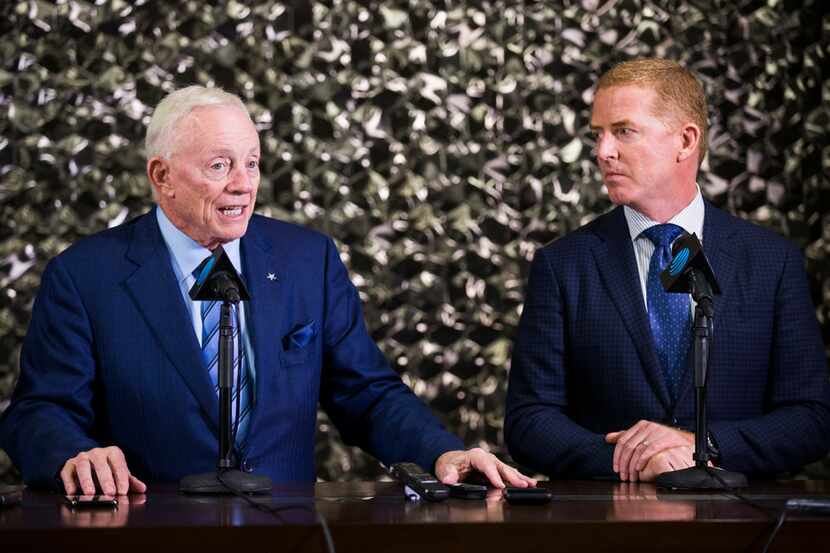 Cowboys owner Jerry Jones (left) and head coach Jason Garrett speak at a press conference...