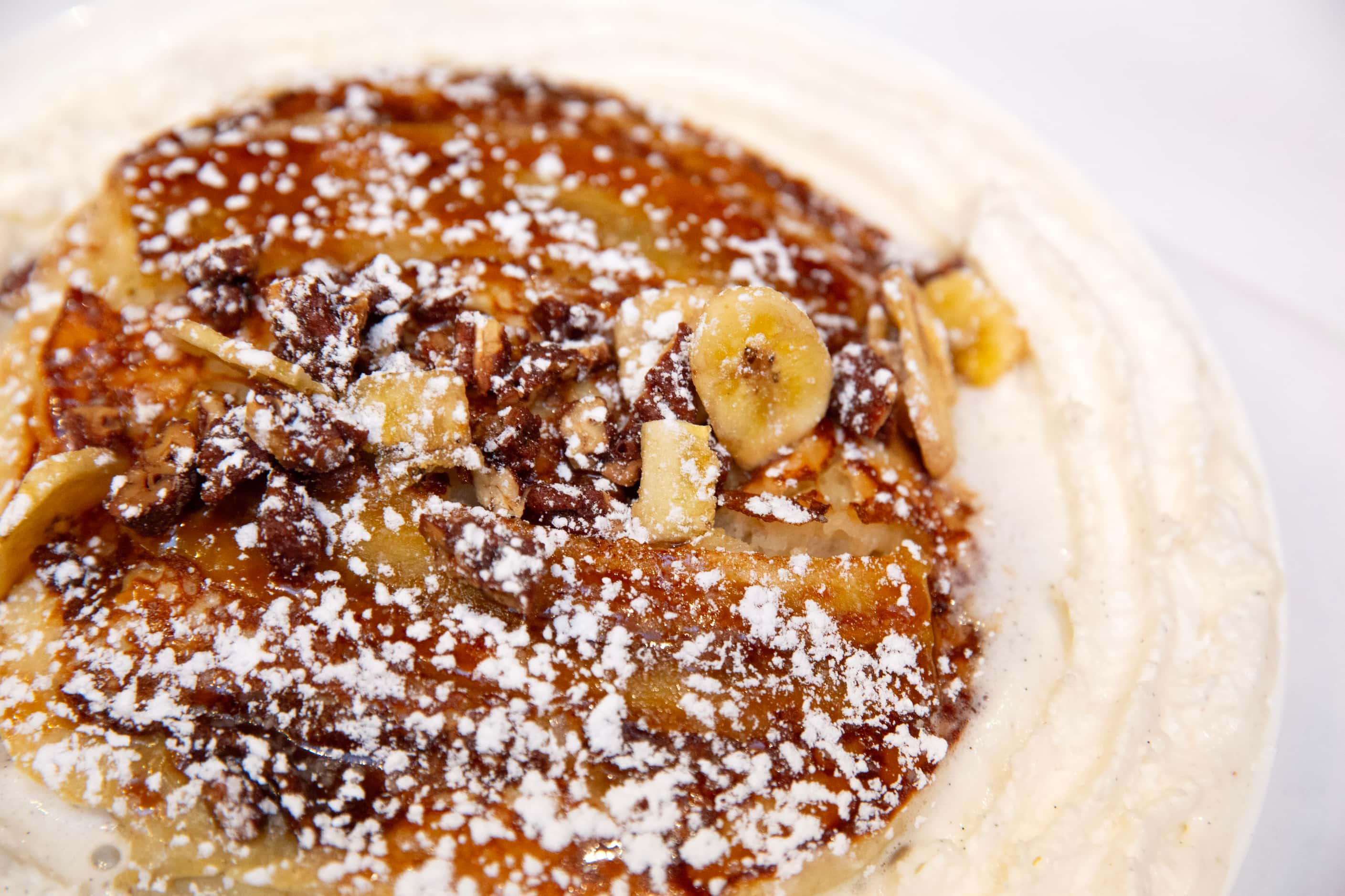 Bananas foster pancakes are served at breakfasttime at Little Daisy in Dallas' Thompson hotel.