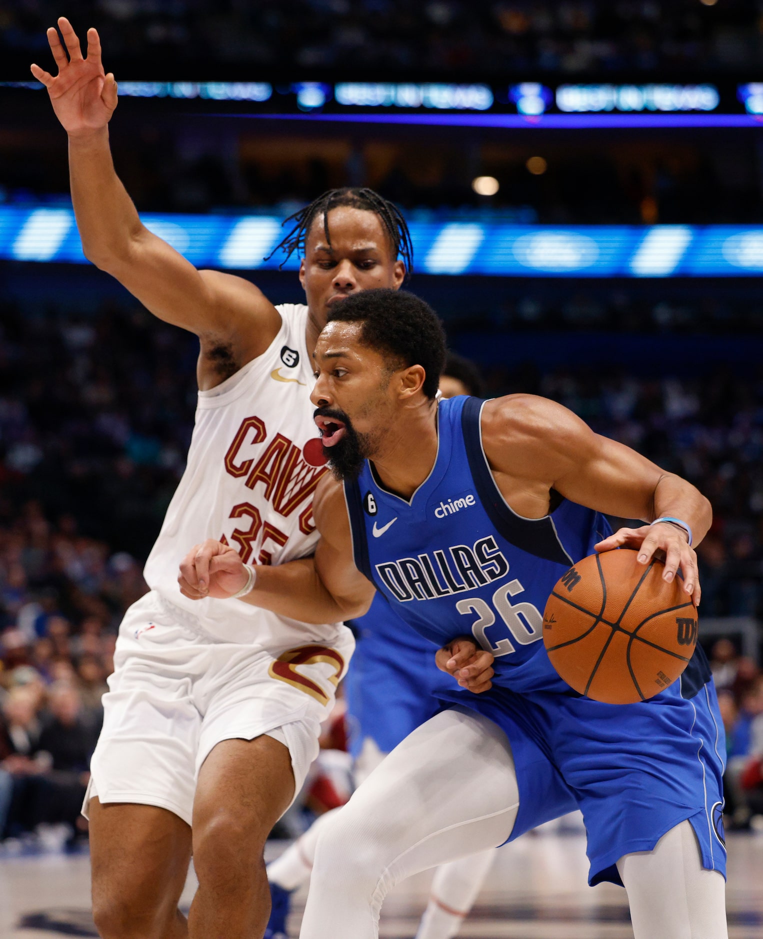 Dallas Mavericks guard Spencer Dinwiddie (26) drives to the basket against a defending...