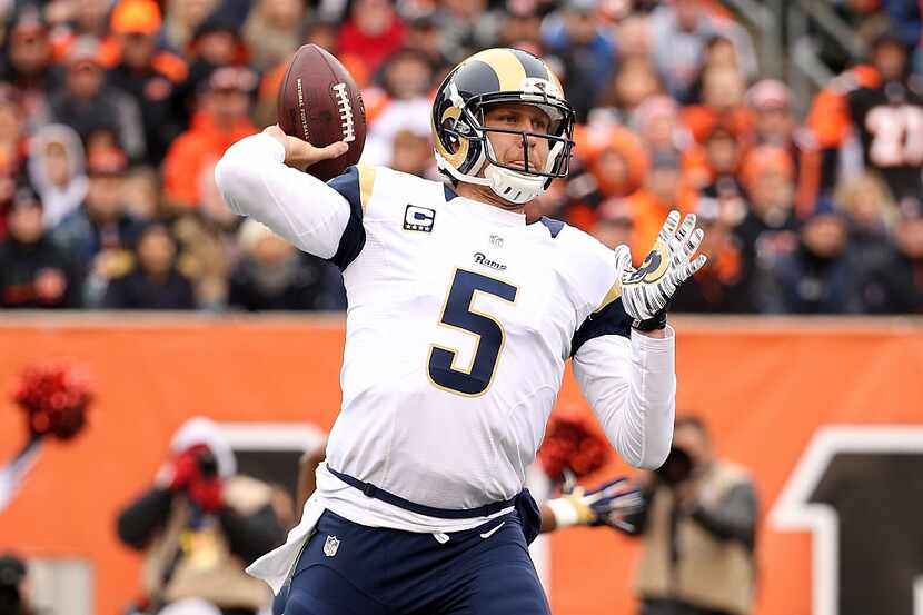CINCINNATI, OH - NOVEMBER 29: Nick Foles #5 of the St. Louis Rams winds up for a pass during...