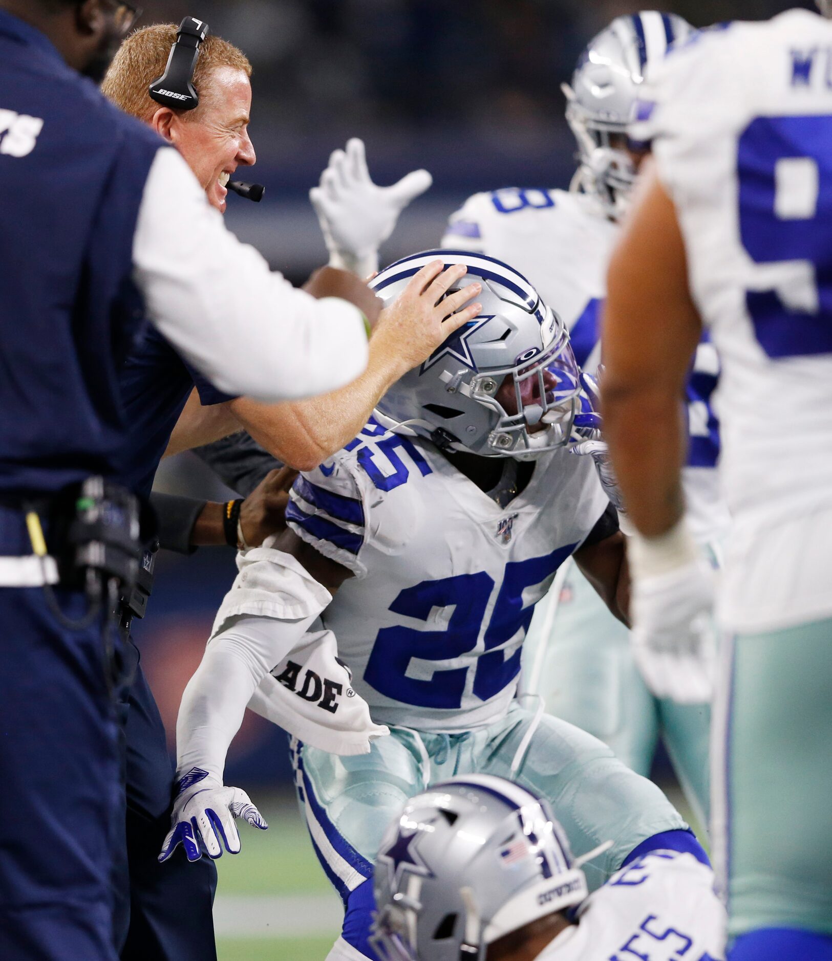 Dallas Cowboys head coach Jason Garrett celebrates with Dallas Cowboys free safety Xavier...