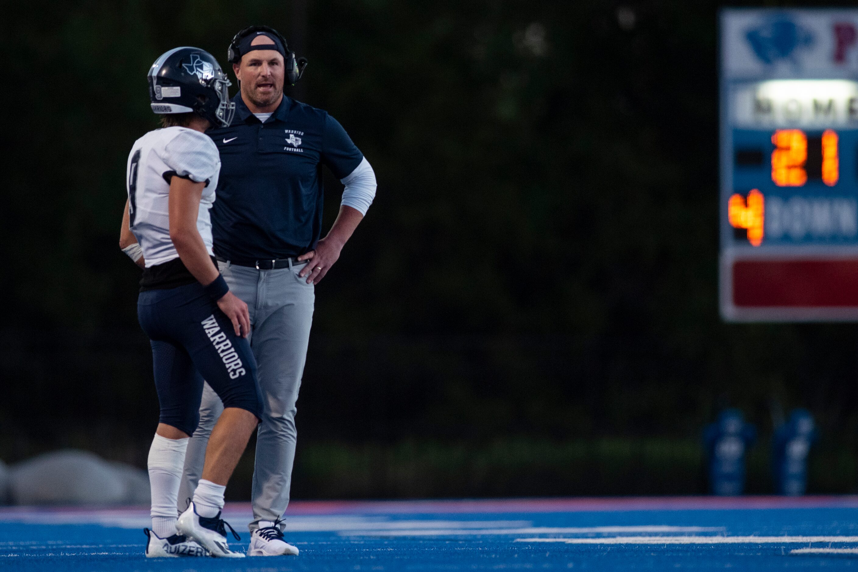 Argyle Liberty Christian Head Coach Jason Witten talks to Argyle Liberty Christian junior...