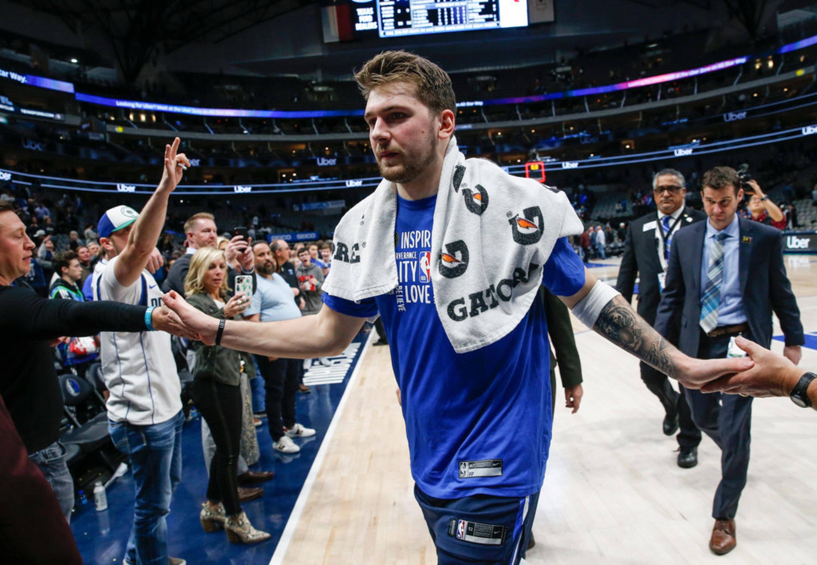 Dallas Mavericks guard Luka Doncic (77) exits the court following a win over the Sacramento...