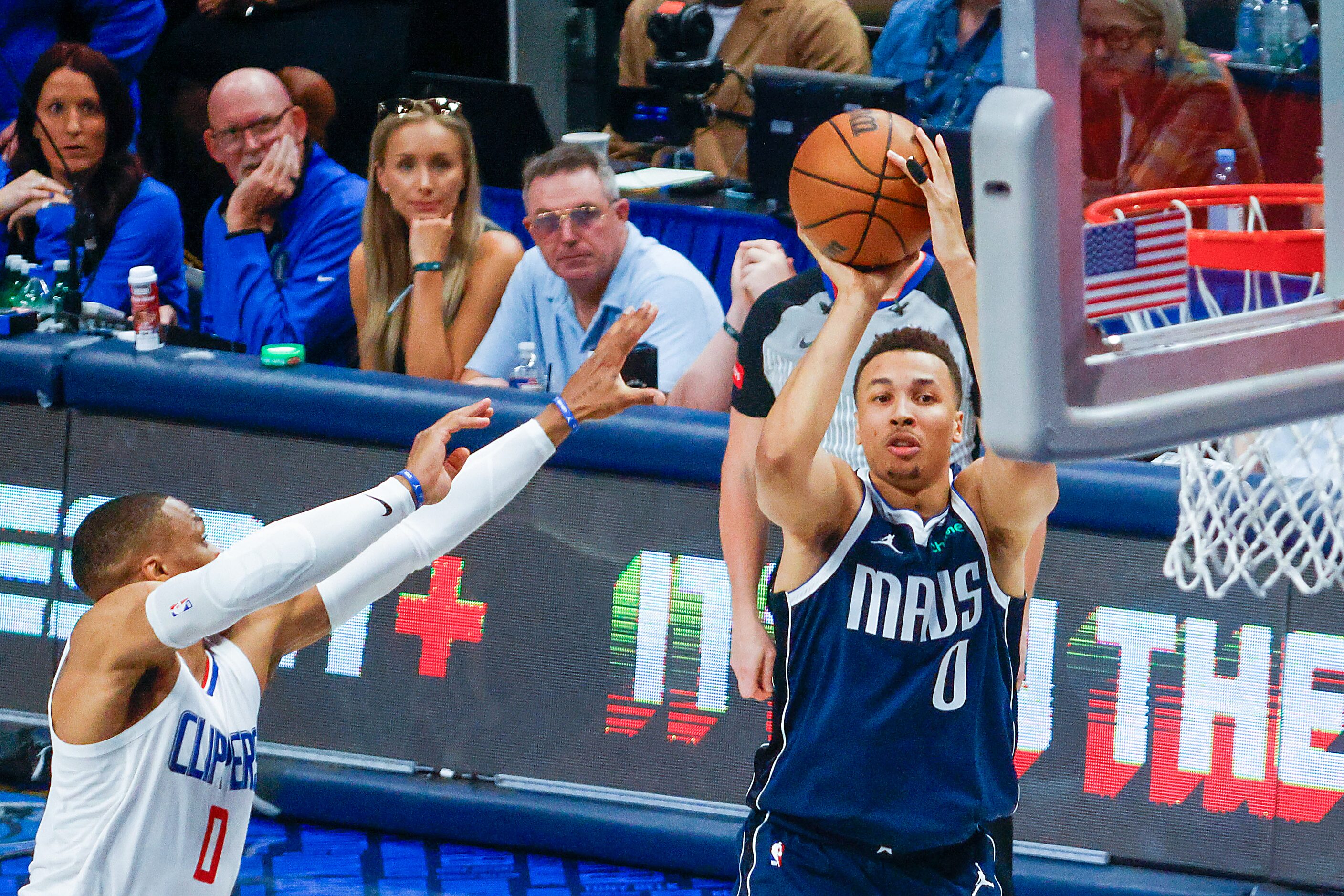 Dallas Mavericks guard Dante Exum during shoots over LA Clippers guard Russell Westbrook...