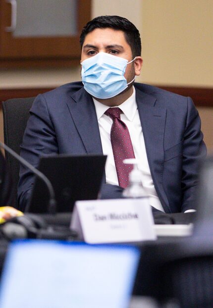 Dallas ISD Trustee, District 8, Joe Carreón listens as a member of the public speaks during...