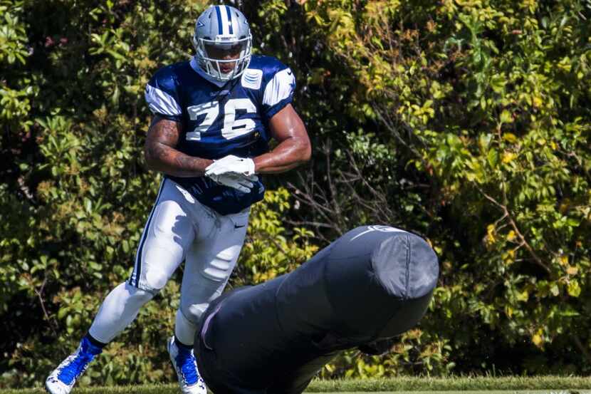 Dallas Cowboys defensive end Greg Hardy (76) runs through a drill during practice on...