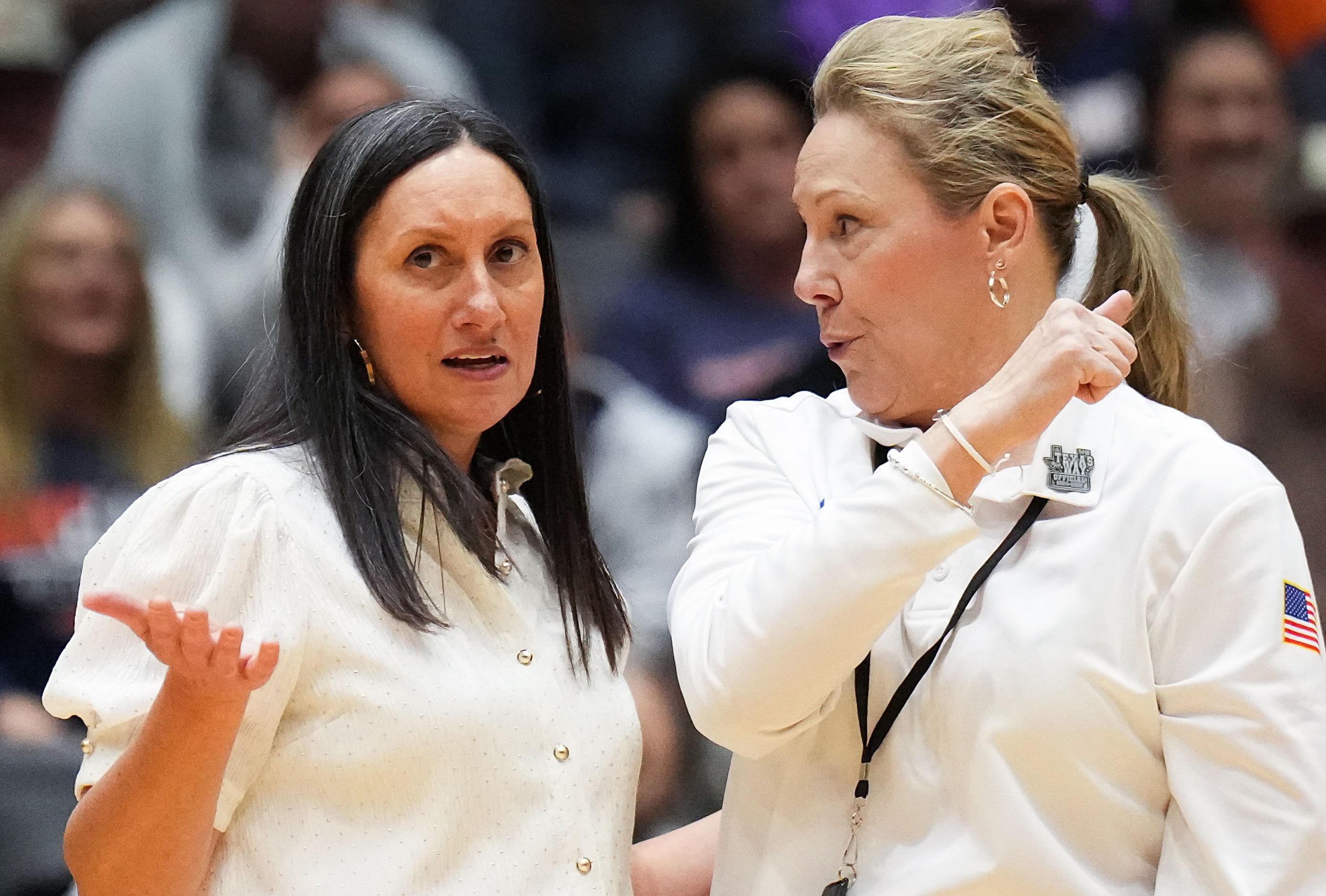 Frisco Wakelan head coach U'iLani Womble talks to an official during the UIL Class 5A...