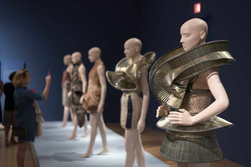 Dresses from fashion designer Iris van Herpen's Chemical Crows collection on display at the...