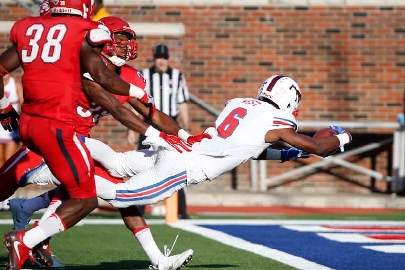 Southern Methodist Mustangs running back Braeden West (6) dives for a touchdown against...