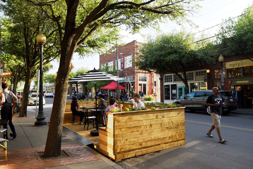 A temporary seating area outside of Revelers Hall on Bishop Avenue in Dallas, Friday, May...