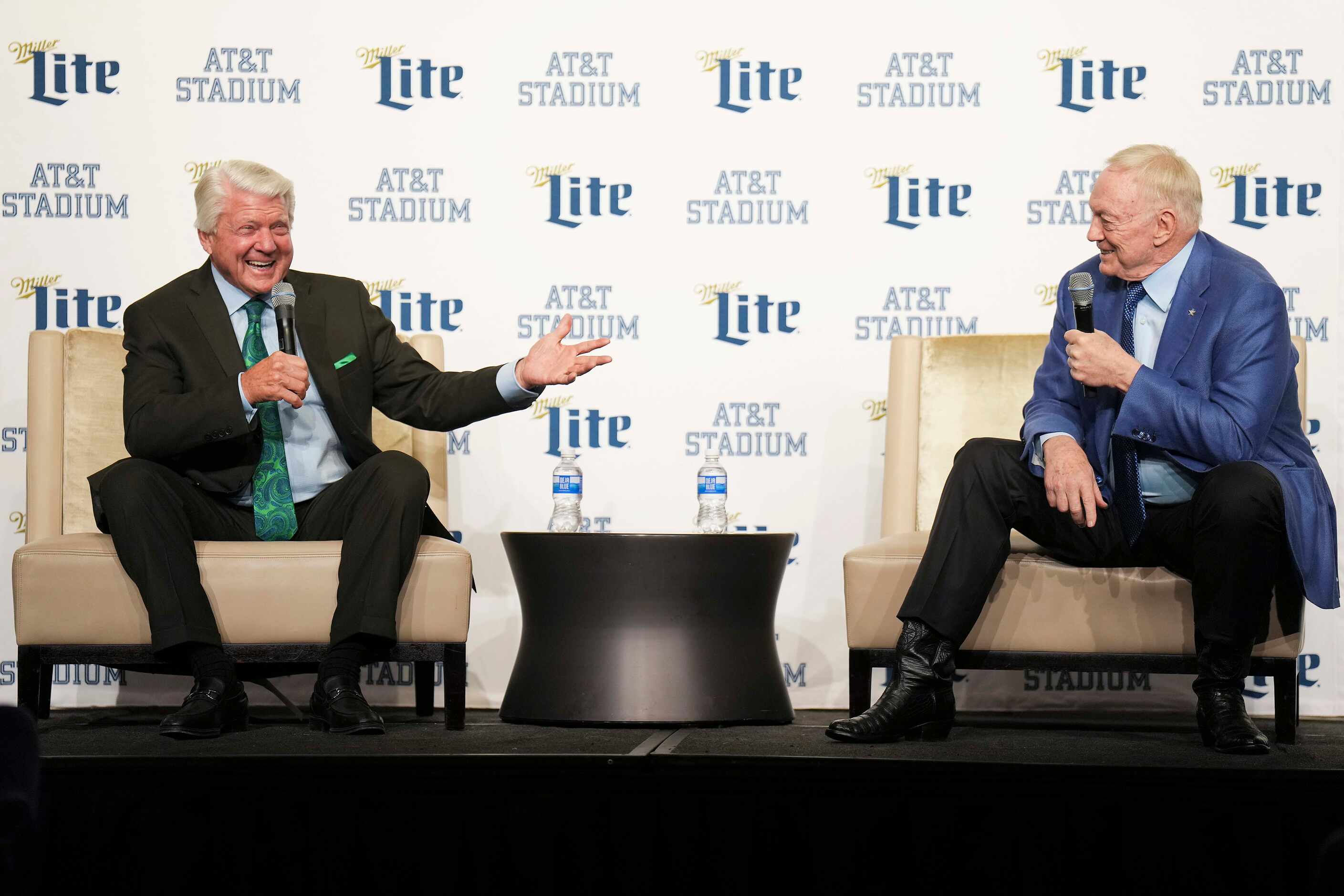 Former Dallas Cowboys coach Jimmy Johnson (left) laughs with Cowboys owner and general...