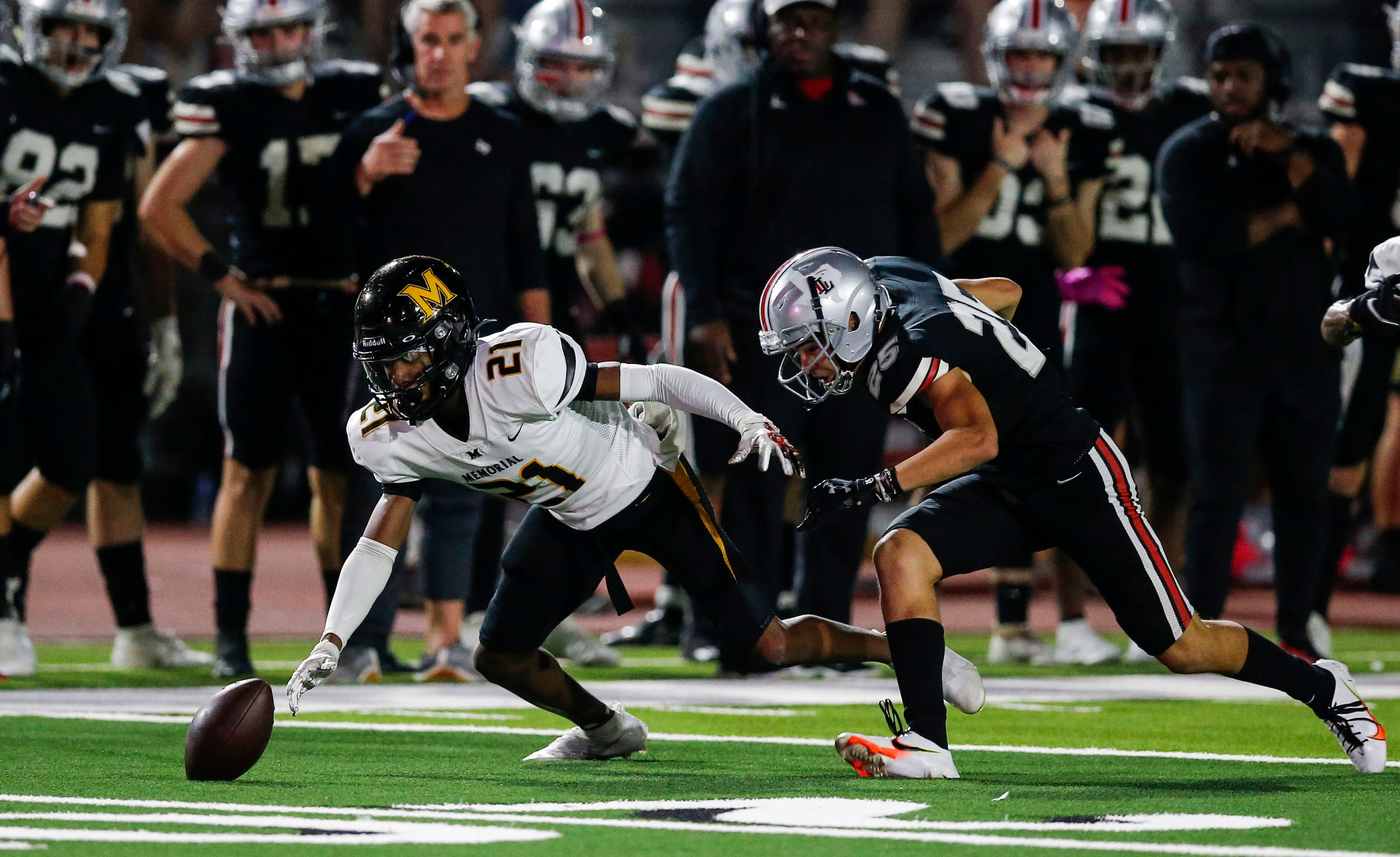 Frisco Memorial sophomore David Wilson (21) fumbles a kickoff return as Lovejoy sophomore...