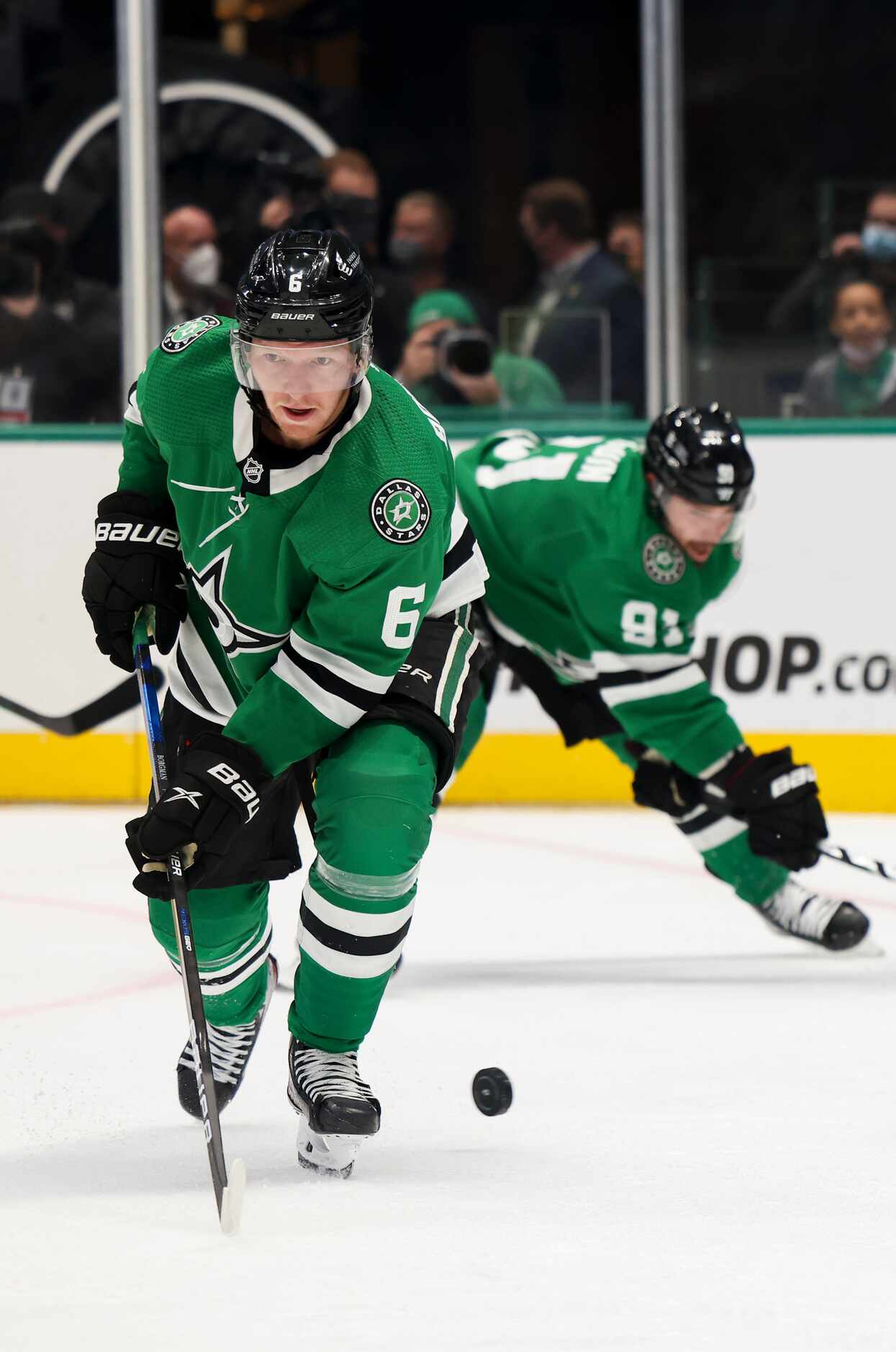 Dallas Stars defenseman Andreas Borgman (6) goes for the puck during the second period of a...
