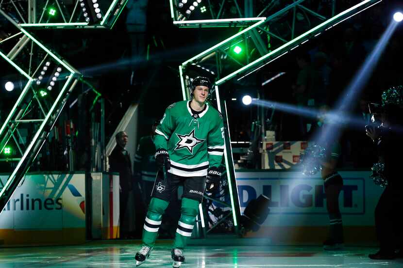 Dallas Stars defenseman Esa Lindell (23) is introduced during the season-opening game at the...