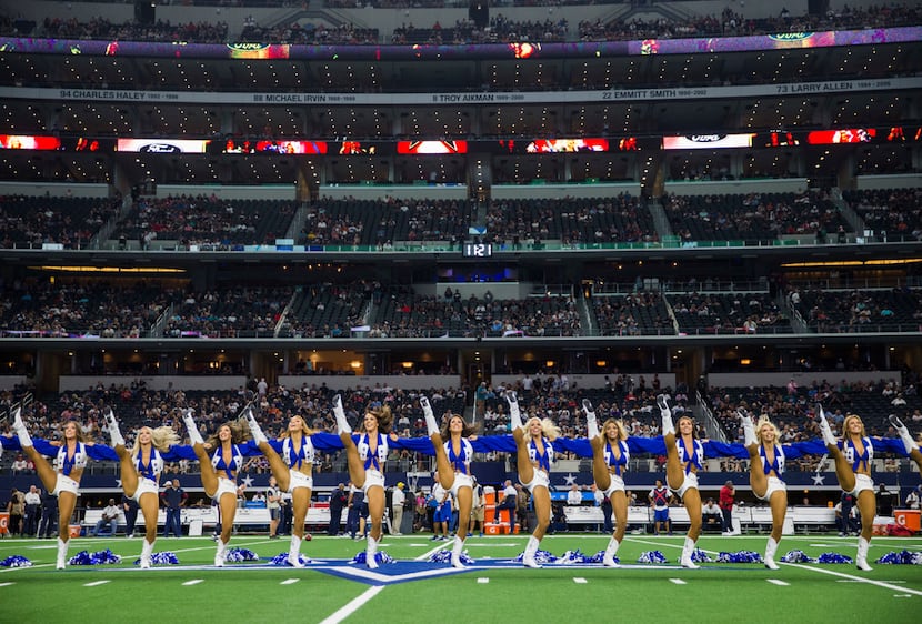Dallas Cowboys Cheerleaders perform before an Aug. 24 preseason game between the Dallas...