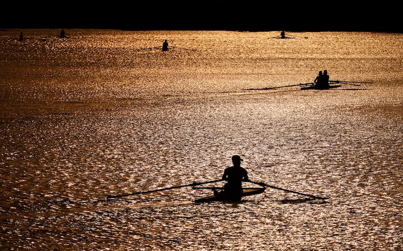 Members of the Dallas Rowing Club and its Juniors program glided across the water during a...