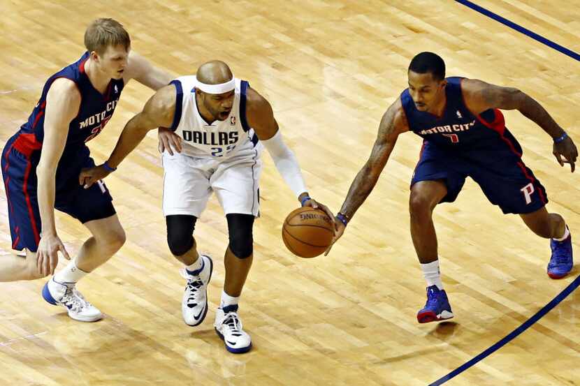 Detroit Pistons point guard Brandon Jennings (7) steals the ball from Dallas Mavericks...