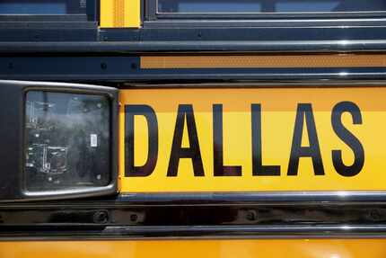 A school bus with cameras sits in the parking lot at the Dallas County Schools headquarters...