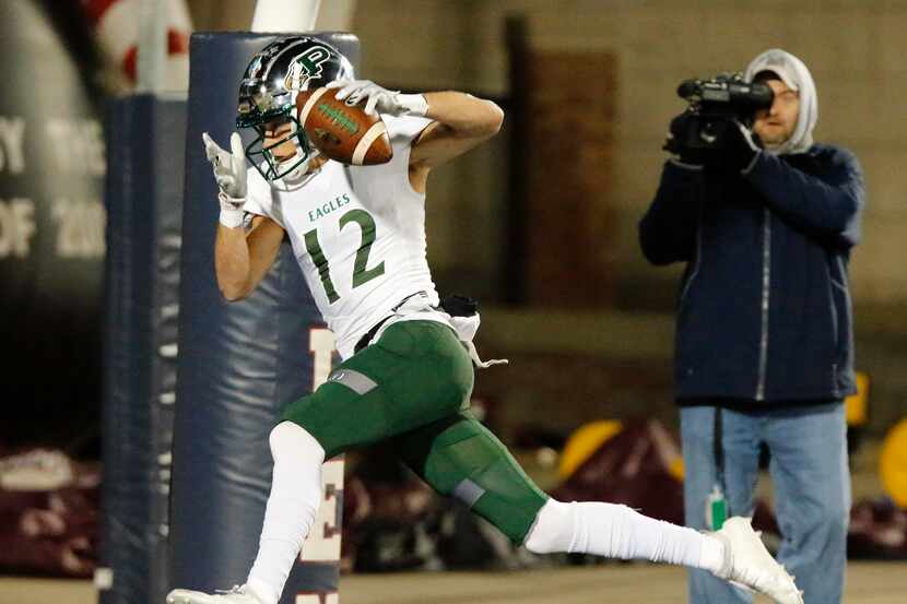 Prosper High School wide receiver Hayden Metcalf (12) catches the games first touchdown...