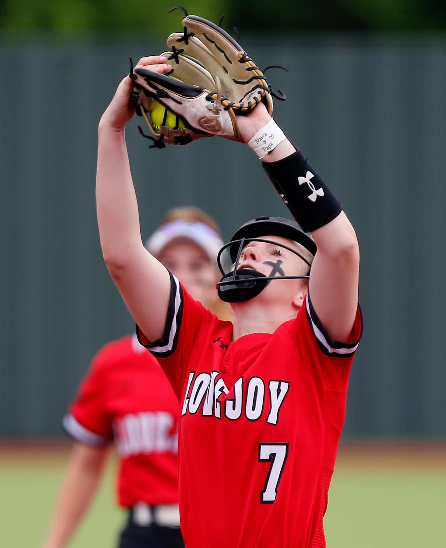 Lovejoy pitcher Jade Owens (7) catches a pop up in the second inning as Lovejoy High School...