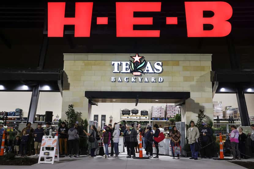 About 250 people waited in line for Wednesday's grand opening of  H-E-B in Plano. The Plano...