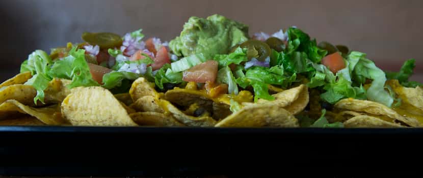 Loaded vegan nachos at Sankofa Kitchen on Friday, July 7, 2017.(Ryan Michalesko/The Dallas...