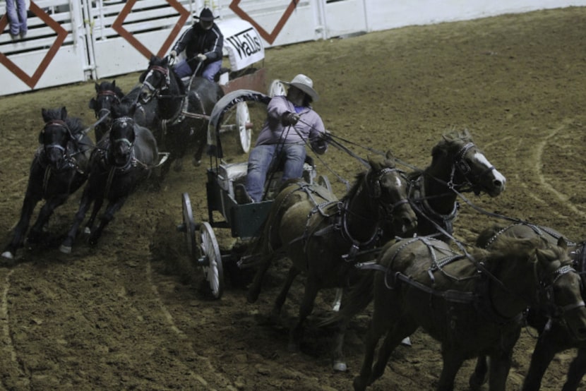 Chuck wagon drivers Blaid Flad (right) of Alberta, Canada, and Warren Burns of Melfort,...