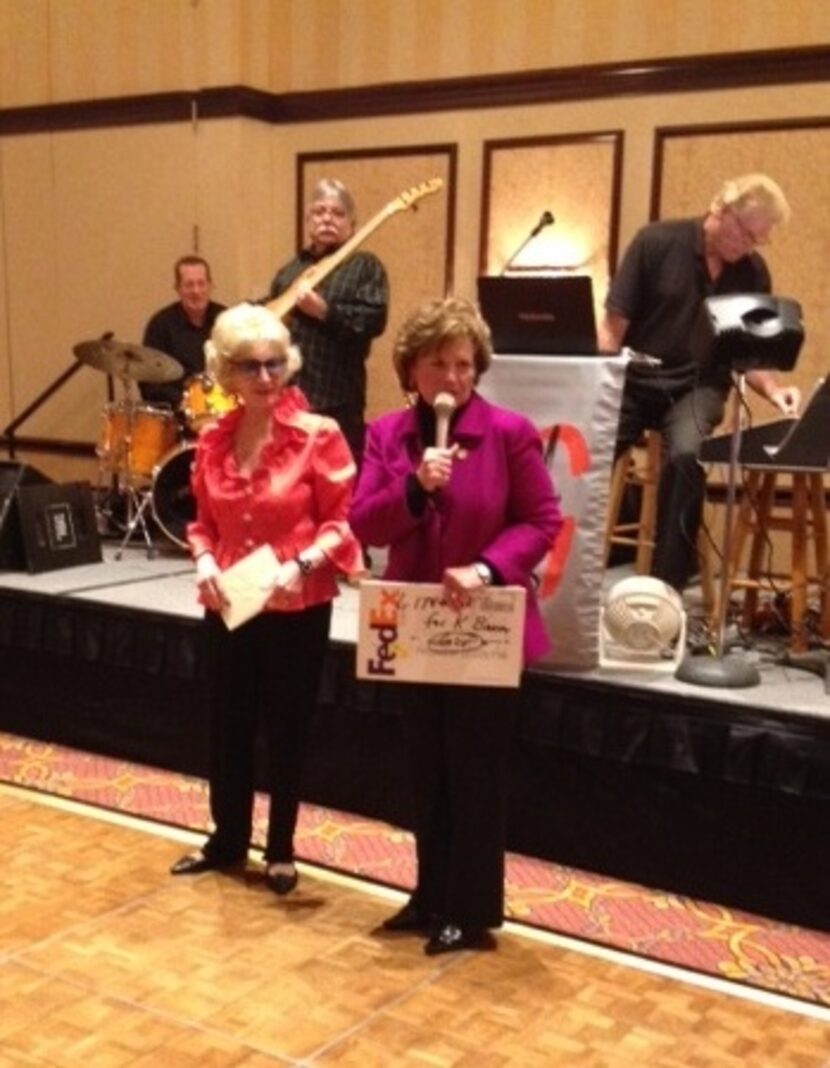 
Rep. Linda Harper Brown presents a celebratory certificate from the governor's office to...