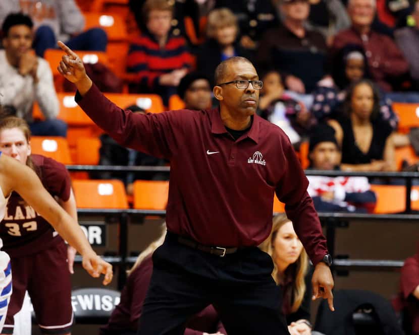 Plano's Rodney Belcher coaches his team against Duncanville during the Class 6A Region I...