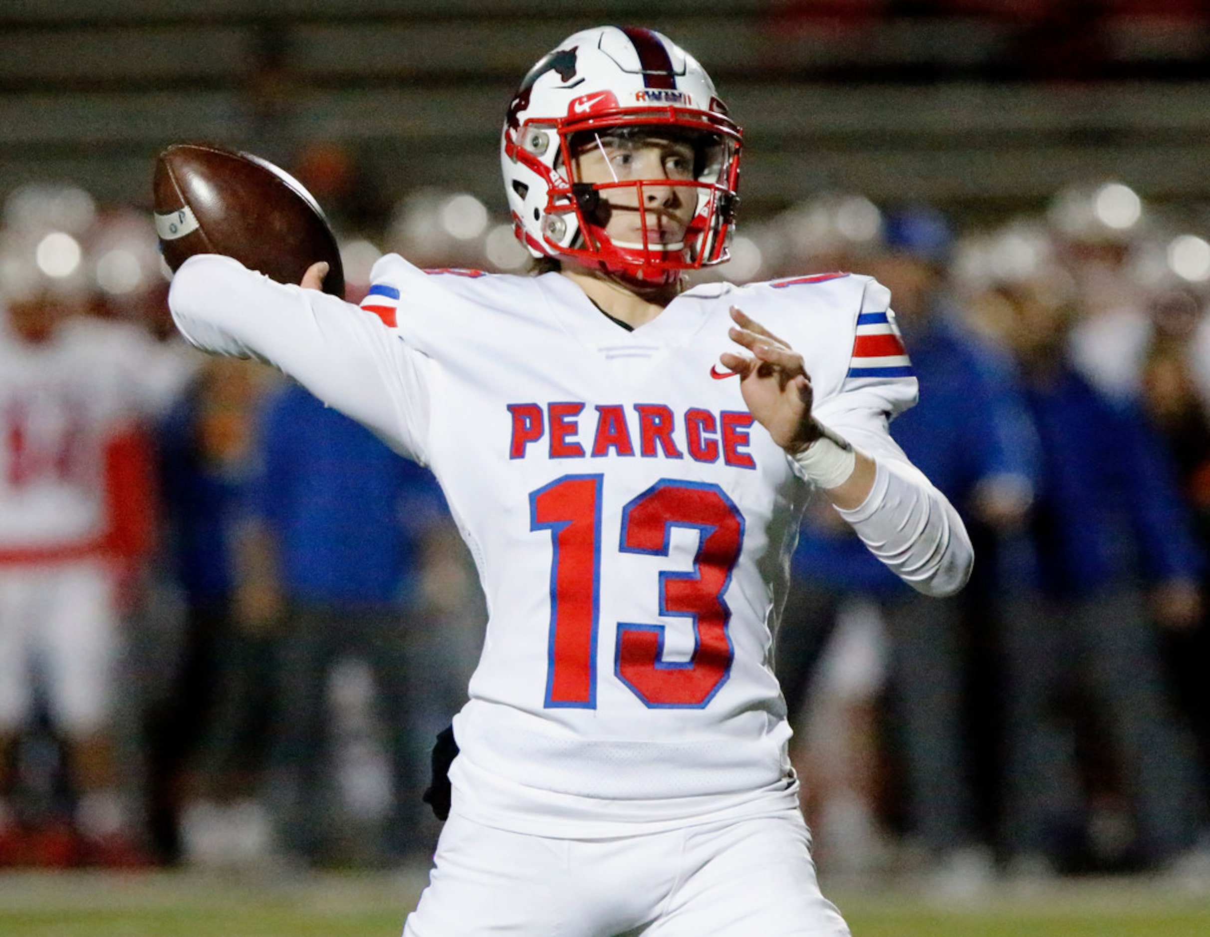 Pearce High School Blake Waters (13) throws a pass during the first half as Cedar Hill High...