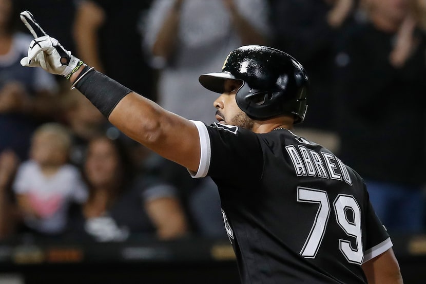 FILE - Jose Abreu of the White Sox celebrates after hitting a three-run home run in the...