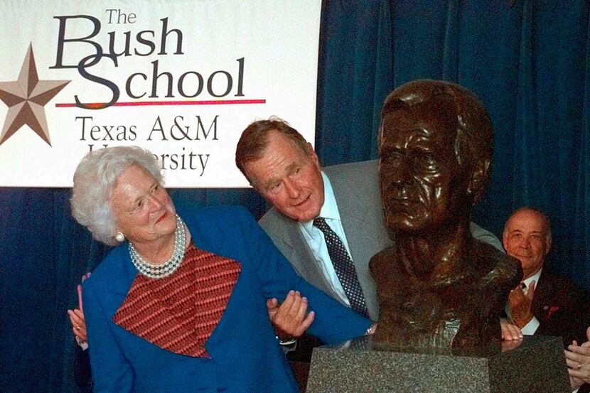 In this Sept. 10, 1997 file photo, former President George Bush and his wife Barbara unveil...