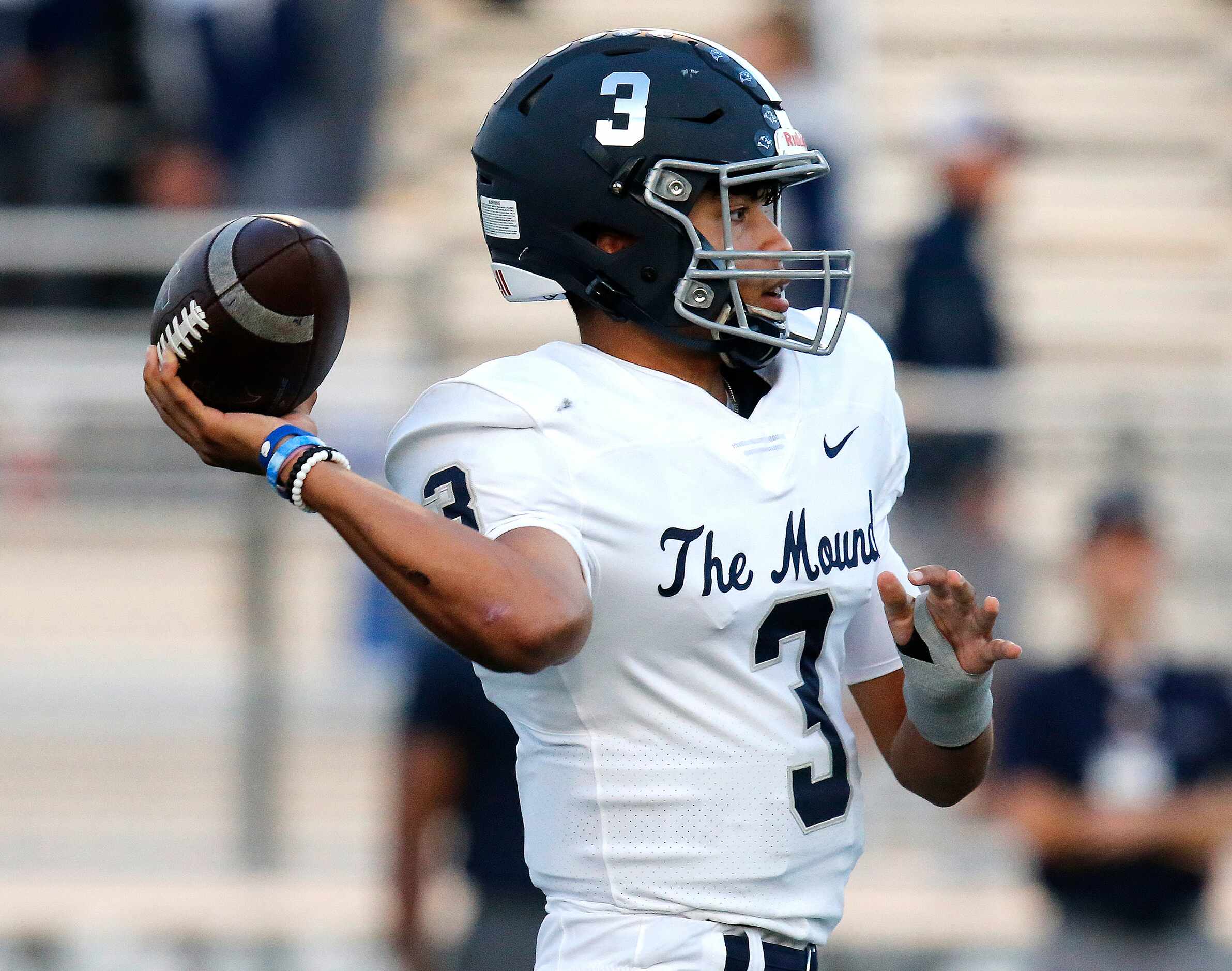 Flower Mound High School quarterback Nick Evers (3) throws a pass during the first half as...
