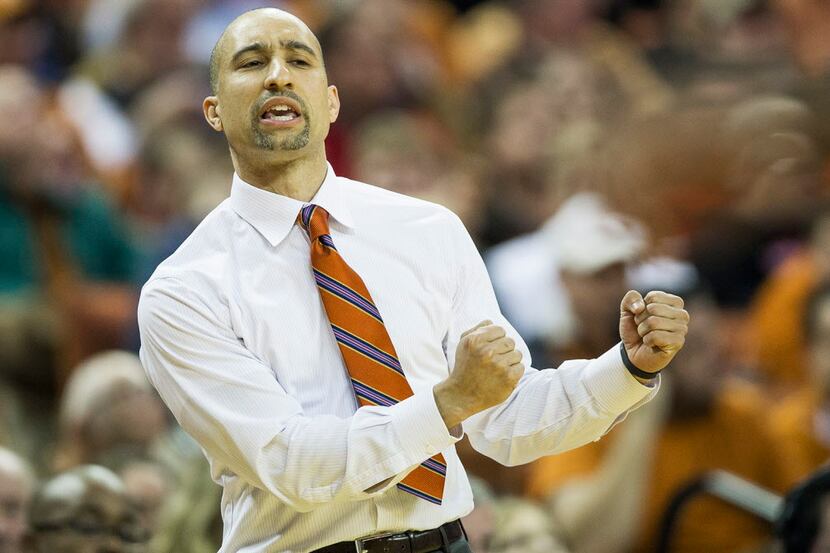 Texas head coach Shaka Smart shouts to his players during action against Texas Tech at the...