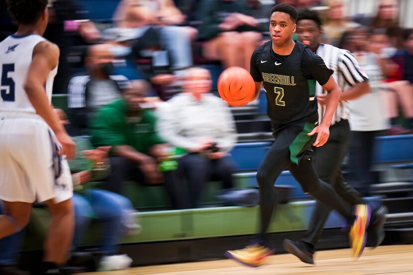 Greenhill guard Noah Shelby (2) brings the ball up the floor during a SPC high school...