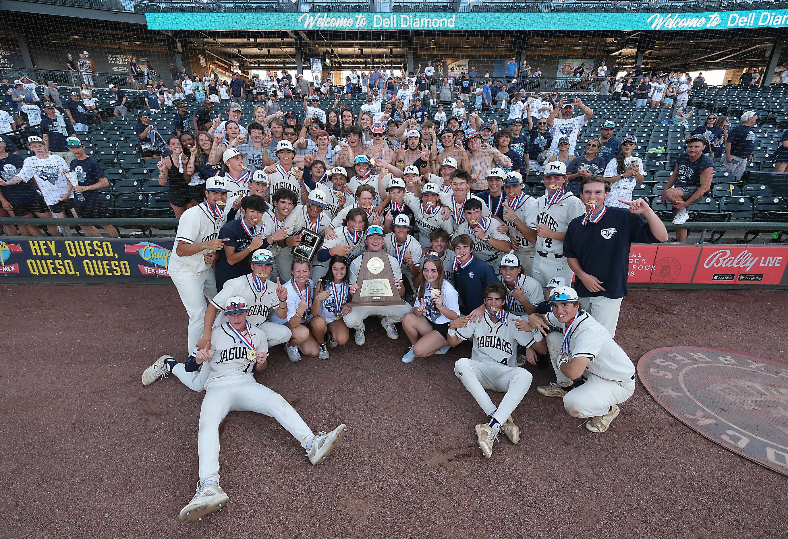 The Flower Mound team pose with fans after defeating Pearland during in the 2023 UIL State...