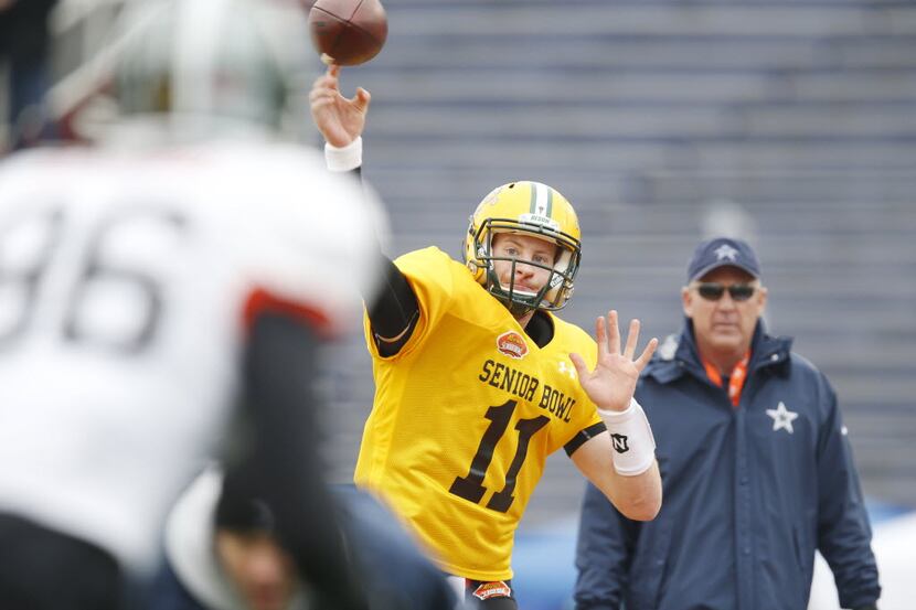 North Dakota State quarterback Carson Wentz of  (11) passes the ball during drills at an...