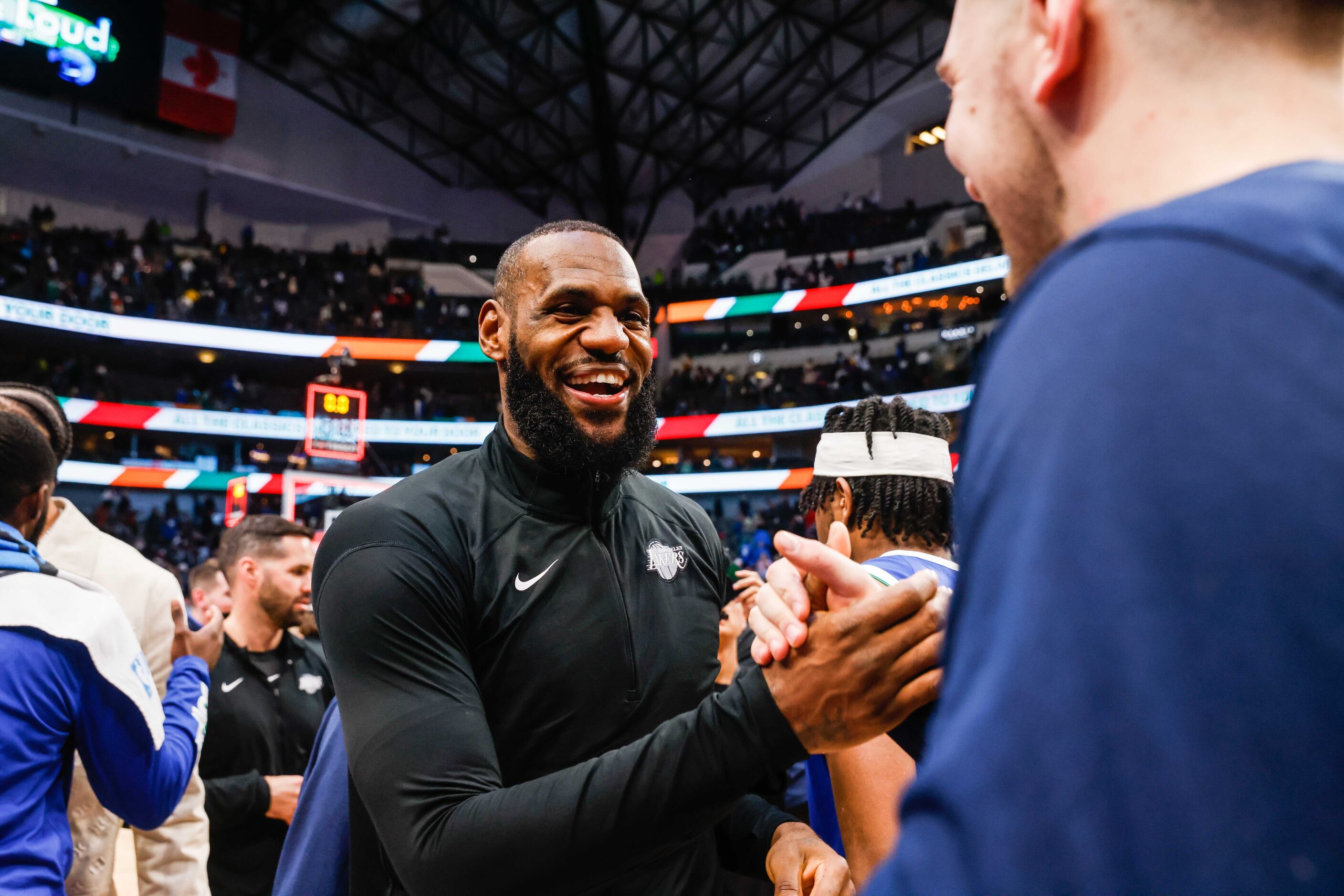 Los Angeles Lakers forward LeBron James (6) congratulates Dallas Mavericks guard Luka Doncic...