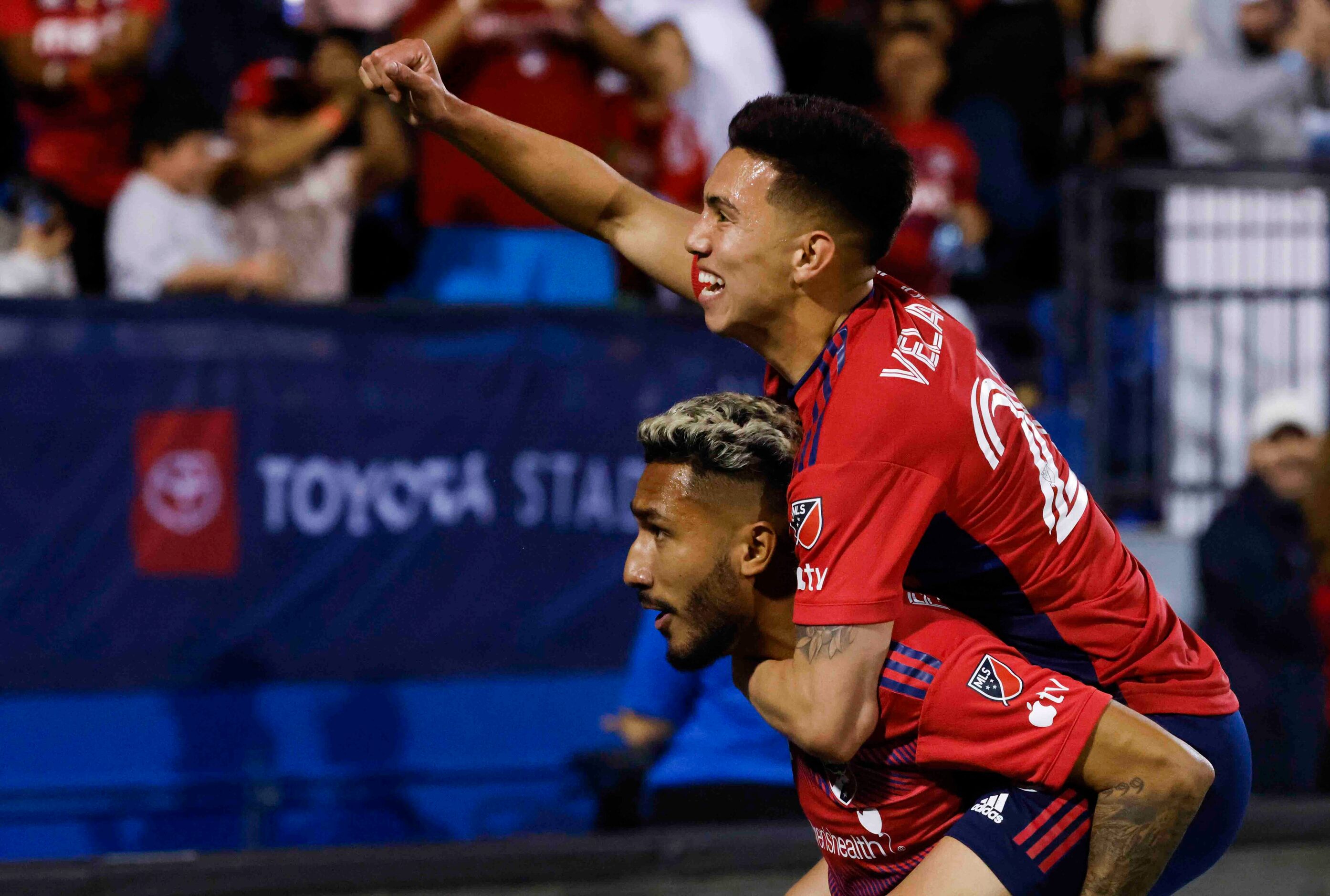 FC Dallas forward Jesús Ferreira and forward Alan Velasco (top) celebrate a goal during the...