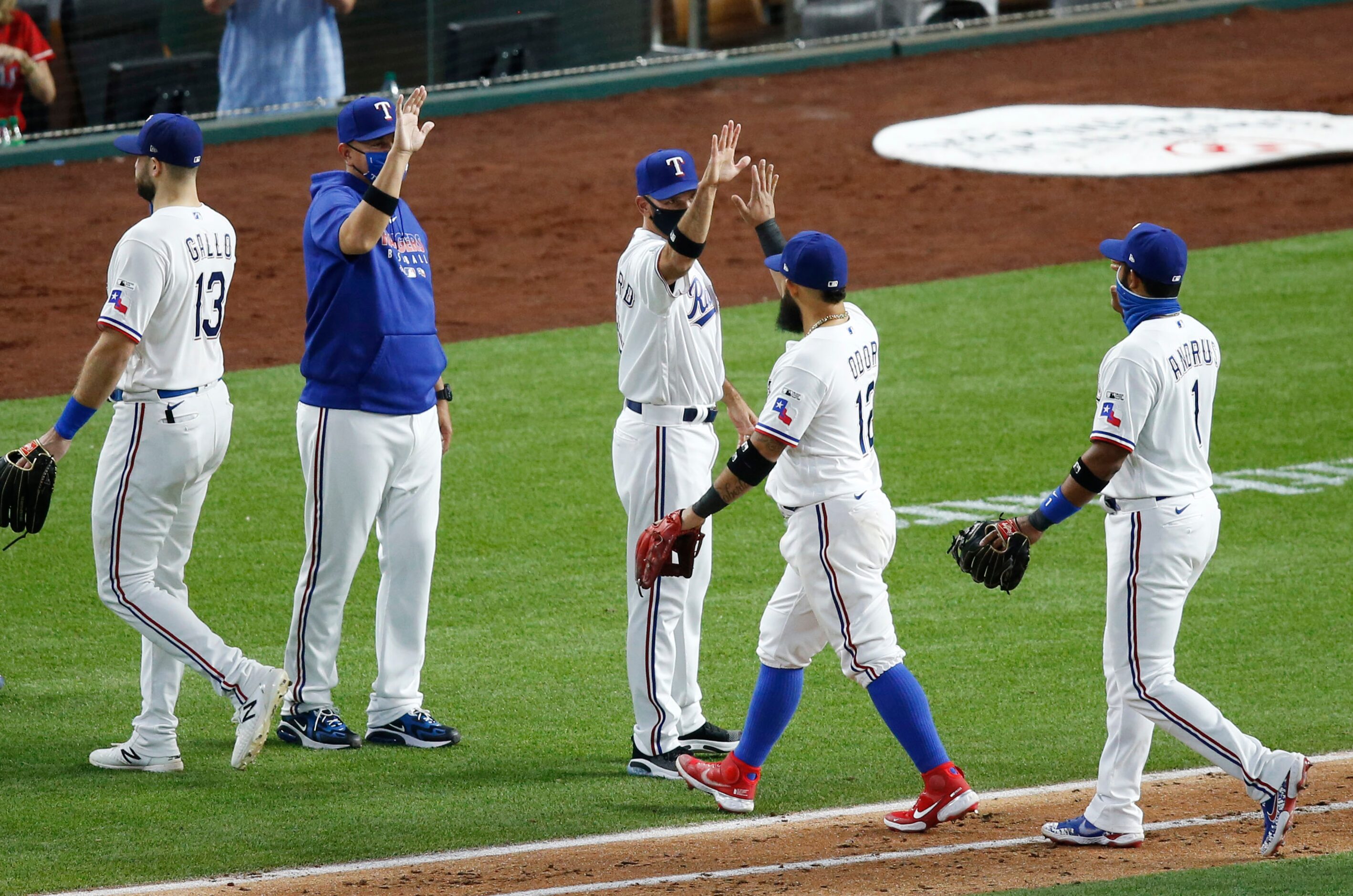 Texas Rangers second baseman Rougned Odor (12) celebrates with Texas Rangers manager Chris...