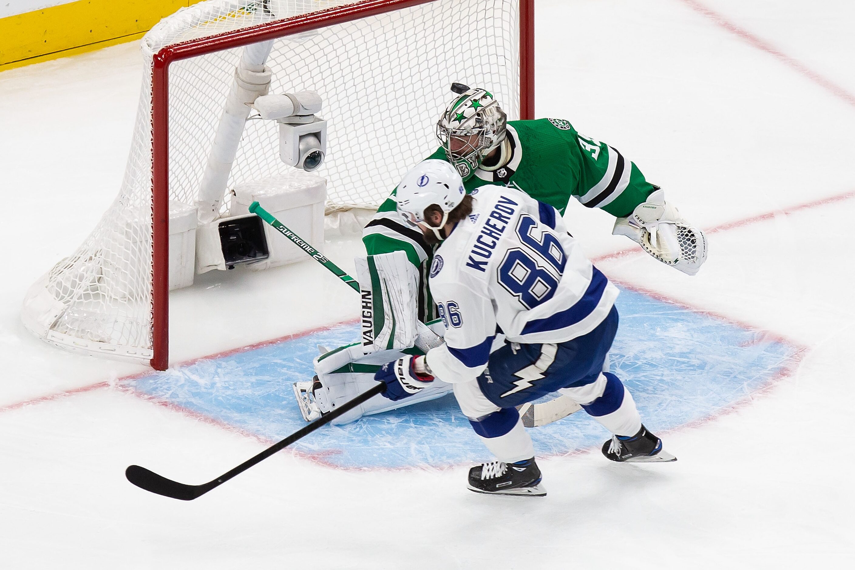 Goaltender Anton Khudobin (35) of the Dallas Stars can't stop Nikita Kucherov (86) of the...